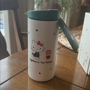Starbucks White Travel Mug with Green Lid